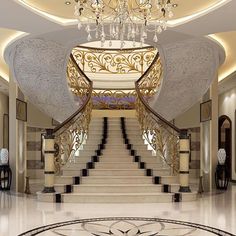 an elegant staircase with chandelier and marble floors