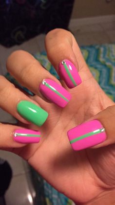 St Patricks Day Nails For Kids, Pink And Green Nails Aka, Pink And Green Dip Nails, Short Pink And Green Nails, Pink St Patricks Day Nails, Alpha Kappa Alpha Nails, Hot Pink And Neon Green Nails, Pink Green Nails Design, Aka Nail Designs