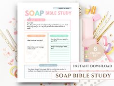 the soap bible study guide is open on top of a table with other items around it