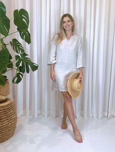 Easy to wear, loose fitting, 100% linen tunic dress, 3/4 length sleeves,  stitched detail around neckline, side splits and raw edge trim on sleeve and hemline. Hemline is above the knee. SIZECHART    Body Measurement/cm Aust. Size  8-10  General Size  S    BUST(cm) 85-90  WAIST(cm) 67-72  HIPS(cm) 93-98  Aust. Size  10-12  General Size  M BUST(cm) 90-95  WAIST(cm) 72-77   HIPS(cm) 98-103    Aust. Size  12-14 General Size  L     BUST(cm) 95-100  WAIST(cm) 77-82  HIPS(cm) 103-108 Aust. Size  14-16 Beige 3/4 Sleeve Dress For Beach, Shift Linen Dress For Spring Beach Occasions, Summer Tunic With 3/4 Sleeves For Daywear, Spring Long-sleeve Neutral Linen Dress, Spring Long Sleeve Neutral Linen Dress, Neutral Long Sleeve Linen Dress For Spring, Spring Neutral Long Sleeve Linen Dress, Spring Linen Tunic Dress, Summer Tunic With 3/4 Sleeves And Relaxed Fit