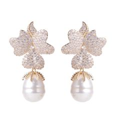 pair of pearl and crystal flower earrings with pearls on the bottom, set in 18k yellow gold