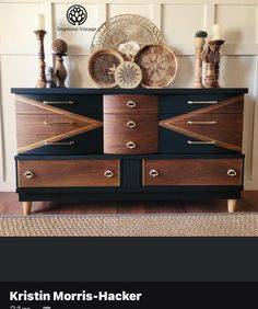 a black and brown dresser with baskets on top