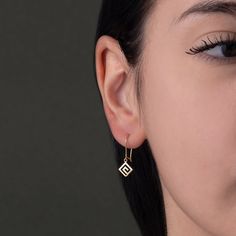 "Greek Key Dangle Earrings in 14k Solid Gold, Greek Key Earrings, Greek Earrings, Greek jewelry 𝐏𝐑𝐎𝐃𝐔𝐂𝐓 𝐃𝐄𝐓𝐀𝐈𝐋𝐒 Gold circle earrings inspired by the Ancient Greek design \"Meander\". Meander was the most important symbol in Ancient Greece, symbolizing infinity or the eternal flow of things. Kt: K14 Width: 0.8 cm - 0.31″ Height: 2.2 cm - 0.86\" Weight: 0.8 gr Timeless earrings. Α great addition to your jewelry collection and daily outfit.  ✦ Handmade in Greece All our handcrafted cr 14k Gold Diamond Earrings With Ear Wire As Gift, Everyday Diamond Cut Drop Earrings, 14k Gold Diamond-cut Linear Earrings As Gift, 14k Gold Diamond Cut Linear Earrings For Gift, 14k Gold Diamond Cut Linear Earrings As Gift, Ancient Greek Design, Greek Earrings, Gold Circle Earrings, Timeless Earrings