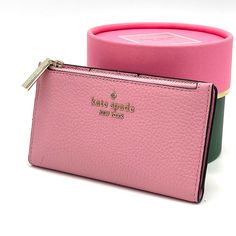 Brand New With Tag Kate Spade Leila Small Slim Bifold Wallet Product Details Color: Bright Carnation 3.1" H X 5.5" W X 0.9" D Pebbled Leather Ksny Metal Pinmount Logo Two Way Spade Jacquard Lining Interior: 5 Credit Card Slots, Id Window, 2 Slip Pockets Exterior: Top Zip Coin Compartment On Front Of Wallet Snap Closure Dust Bag Not Included Imported Pink Rectangular Feminine Wallet, Pink Feminine Rectangular Wallet, Feminine Pink Wallets For Daily Use, Pink Feminine Wallet For Everyday Use, Feminine Pink Wallet For Everyday Use, Pink Feminine Wallet For Everyday, Feminine Pink Wallet, Compact Pink Coin Purse For Travel, Compact Pink Travel Coin Purse