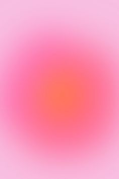 an orange and pink colored blurry background