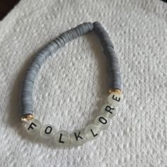 Polymer Clay Beads Folklore Letter Beads Two Gold Plated Tube Beads Letter Beads, Polymer Clay Beads, Tube Beads, Clay Beads, Womens Jewelry Bracelets, Beaded Bracelet, Gray White, Polymer Clay, Gold Plate