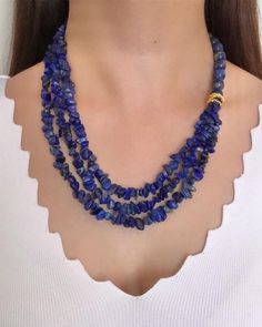 Lapis Lazuli Chunky Beaded Multistrand Necklace ✅ NECKLACE FEATURES * Handmade Item: each necklace is meticulously crafted by hand, ensuring quality and uniqueness. * Materials: 10 mm lapis lazuli and raw lapis lazuli natural stone, gold-plated details and chain * Length: 48 cm (19 inches) + 5 cm (2 inches) adjustment chain.    -If you require a longer extension chain, please let me know. * Color Discrepancies: Please be aware that color variations may occur due to different monitor settings. * Natural Stone Variations: Natural stones may vary slightly in size, shape, and color tones due to their unique characteristics. These small differences make your jewelry special and one-of-a-kind. ⭐️ This elegant necklace is crafted with 10 mm lapis lazuli and raw lapis lazuli stones, celebrated for Blue Gemstone Beads Necklace For Wedding, Blue Single Strand Beaded Necklace For Wedding, Blue Single Strand Wedding Necklace, Blue Gemstone Beads Necklaces For Party, Blue Gemstone Beads Necklace For Party, Blue Gemstone Beaded Necklaces For Party, Blue Wedding Jewelry, Anniversary Gift For Wife, Mother Birthday