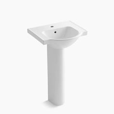 a white pedestal sink on a white background