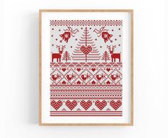 a cross stitch christmas pattern with deers and hearts on the bottom, in red