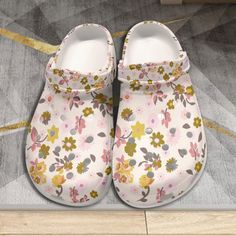 Step into summer with our Boho Floral Slip-On Clogs, the perfect blend of comfort and style for women.  Crafted with a lightweight design, these clogs feature a charming floral pattern that adds a touch of bohemian flair to any outfit.  Whether you're gardening, strolling on the beach, or simply running errands, these non-slip sandals offer reliable traction and support.  Slip them on effortlessly and enjoy the ease and versatility they bring to your summer wardrobe. The upper is made of EVA Fea Non-slip Flat Clogs For The Beach, White Flat Clogs For Beach, White Flat Clogs For The Beach, Vacation Slip-on Clogs With Cushioned Footbed, Summer Flat Non-slip Clogs, Slip-on Clogs With Cushioned Footbed For Vacation, Non-slip Flat Clogs For Summer, Casual Non-slip Clogs For Beach, White Closed Toe Clogs For Vacation