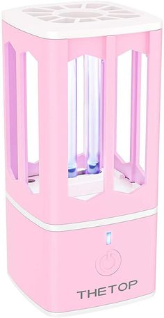 the top is pink and has three tubes in it's center, as well as two