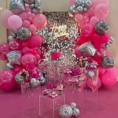 pink and silver party decorations with balloons