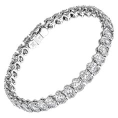 Diamond Tennis Bracelet Timeless and classic! Not your typical tennis bracelet - ovals bring nice elegant touch and look twice bigger then round diamonds - truly a statement piece Mounted in Platinum with 37 Oval diamonds - each one GIA certified - totaling 18.67ct (0.5 ct each stone): • 0.50ct IF E GIA#6213189820 • 0.50ct VVS1 E GIA#2366289526 • 0.50ct VVS2 D GIA#6217217702 • 0.50ct VVS2 E GIA#1367485419 • 0.51ct VVS2 E GIA#2215233896 • 0.50ct VS1 D GIA#5212261290 • 0.50ct VS1 D GIA#2211144664 Wedding Jewellery Designs, Expensive Jewelry Luxury, Diamond Tennis Bracelet, Expensive Jewelry, Tennis Bracelet Diamond, Oval Diamond, Fashion Books, Tennis Bracelet, Diamond Bracelet