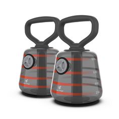 two gray and orange speakers with black handles