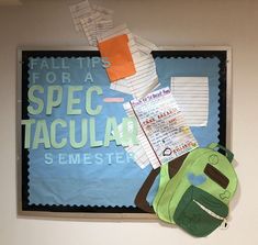 a bulletin board with paper and other items on it