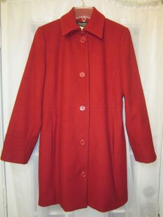 ***Signature By Harve' Benard Red Color 100% Wool Long sleeve Button Up Coat*** *Condition: Pre-owned in Excellent Condition *From smoke free home *Material: Shell- 100% Wool, Lining- 100% Polyester *Size: Women's 4 *App Lay it Flat Measurements Armpit to armpit:20" Waist: 17.5"(x2) Sleeves from seam of shoulder to bottom cuff:24.5" Shoulders from seam of shoulder to shoulder:16" Total rear length from seam of collar to bottom hem:34"                                            *Thanks for lookin Classic Red Outerwear, Tailored Red Outerwear With Button Closure, Red Collared Outerwear With Button Closure, Classic Red Button-up Outerwear, Red Cotton Button-up Outerwear, Vintage Red Button-up Outerwear, Red Color, Button Up, Coats For Women