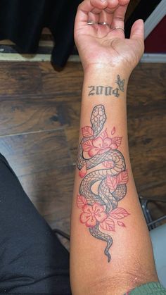 a person with a tattoo on their arm