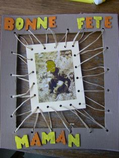 a photo frame with the words bone ete mama on it and an image of a baby