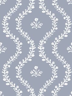 a gray and white wallpaper with floral designs on the back ground, in an ornate pattern