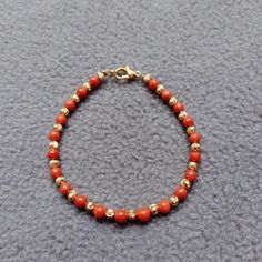 Brilliant Coral 100% Natural Italian Red-Orange Coral Bracelet, Coral Handmade Beautiful Bracelet, Best Quality Smooth Beads Bracelet, Gemstone : Natural Red Coral  Product : Coral Bracelet  Carat Weight : 23.40 Carat   Strand Length;- 7 Inches  Color : As Seen In Picture Payment policy We accept the payment via PayPal only. Shipping policy We Ship the item as per our shipping policy once we receive the payment. We understand that getting your items quickly is important to you, so we make every Red Coral Bracelet, Orange Faceted Beaded Bracelets, Orange Faceted Round Beaded Bracelets, Orange Beaded Bracelets With 8mm Round Beads, Hand-strung Coral Bracelets With Round Beads, Hand-strung Orange Beads As A Gift, Coral Bracelets With Colorful Round Beads, Orange Bracelets With Colorful Beads For Jewelry Making, Handmade Coral Bracelet With Round Beads