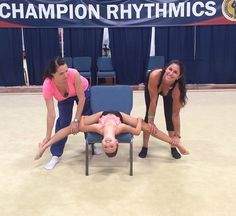 three women are doing exercises on a chair