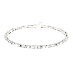 A baguette bar bracelet features a sleek, horizontal bar set with baguette-cut diamonds or gemstones. The clean lines and elongated shape of the baguette cuts create a sophisticated and modern look, while the bar setting adds a touch of understated elegance. Custom made to order. Please allow 2-3 weeks for delivery Bar Setting, Bar Bracelet, Baguette Cut Diamond, Bar Bracelets, Baguette Cut, Custom Jewelry Design, Understated Elegance, Bar Set, Baguette Diamond