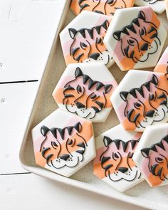 decorated cookies with tiger faces on them