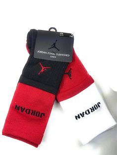 NIKEJORDAN AIR 2-Pairs HIGH CREW SOCKS Big Kids Sock Size 6-7 or Shoe Size 5Y -7Y  Is your kid also a Jordan lover down to his socks? Then these Jordan High Crew Socks are shouting their name. There's a JORDAN branding on the outerside of each sock that lets everybody know they represent that Jumpman to the fullest. Not only do these look good, they feel good, too.Up your Jordan game with these Air Jordan High Crew Socks. FEATURES:FABRIC: Dri-FIT 98% Polyester /2% SpandexQUANTITY: 2 pairColor: R Red Sporty Socks For Sports, Non-slip Casual Sports Socks, Casual Non-slip Socks For Sports Events, Sporty Red Cotton Socks, Casual Red Socks For Streetwear, Sporty Red Breathable Socks, Red Casual Sports Socks, Casual Red Sports Socks, Casual Breathable Red Socks