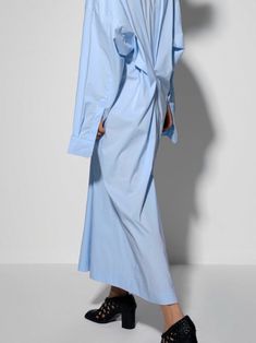 A classic oversized long dress shirt with balloon sleeves and button up cuff. Gathered at the front. Model is in MINUSEY ONE SIZE. ✔️ Free worldwide express shipping over $100✔️ Loved by 6,500+ customers✔️ Limited edition collections, maximum style* MINUSEY ONE SIZE = EU 34-36, US 2-6* 58% Cotton / 37% Nylon / 5% Elastane* Dry clean* Made in Korea - Model Height: 172cm/5'7" (US 2, EU 34) Oversized Long Shirt Dress For Daywear, Oversized Blue Shirt Dress For Workwear, Oversized Blue Button-up Shirt Dress, Oversized Button-up Blue Shirt Dress, Oversized Blue Shirt Dress For Fall, Oversized Long Sleeve Shirt Dress For Office, Oversized Shirt Dress With Button Cuffs For Daywear, Oversized Dress Shirt, Long Dress Shirt