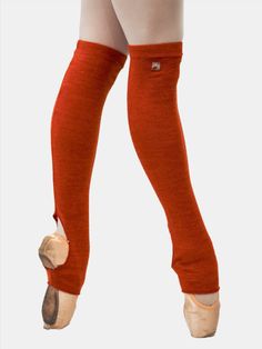 The MP921 orange short dance leg warmers are all you need to keep your muscles warm during your rehearsals or ballet classes. They offer maximum comfort and adapt perfectly to your legs. Product Details Knee-length: 55 cm (21.6 inches) Suitable for both women and men Features an elastic band at the top to prevent sliding, ensuring you won't have to adjust them constantly Includes heel holes, allowing you to wear them comfortably with your dance shoes Crafted from a hypoallergenic and soft-to-touch fabric Composition: 96% Polyester, 4% Elastane Handmade leg warmers Made in Italy For the best care, we recommend handwashing it in cold water and allowing it to air dry. About Atelier della Danza MP's Warm-up products Step into comfort and style with Atelier della Danza MP's sensational warm-up Micro-elastic Footless Legwear For Dance, Flexible Footless Winter Leg Warmers, Footless Winter Leg Warmers, Stretch Footless Dance Legwear, Stretch Footless Legwear For Dance, Footless Leg Warmers For Yoga In Winter, Red Stretch Thigh High Leg Warmers, Red Stretch Thigh-high Leg Warmers, Red Stretch Knee-high Leg Warmers