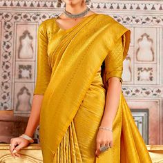 Mustard colored saree is prettified with beautiful weaving work as shown which makes it appear classy. This saree is made of art silk fabric which is accompanied with art silk blouse piece which you can customise as per your design/style. Women can buy this saree to wear for their party, festive, sangeet functions and homely events and ideal for any fashionista. Note:- The actual product may differ slightly in color and design from the one illustrated in the images when compared with computer or mobile screen. Elegant Gold Paithani Silk Pre-draped Saree, Yellow Slub Silk Saree With Unstitched Blouse, Elegant Yellow Pre-draped Saree With Zari Weaving, Gold Slub Silk Blouse Piece For Puja, Designer Yellow Paithani Silk Saree, Designer Paithani Silk Traditional Wear In Gold, Gold Paithani Silk Blouse Piece For Designer Wear, Gold Paithani Silk Traditional Drape Pre-draped Saree, Elegant Yellow Handloom Blouse Piece