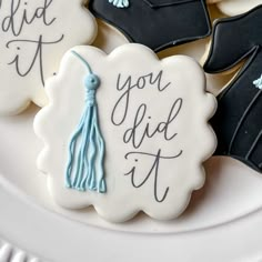 decorated cookies with graduation caps and tassels that say you did it