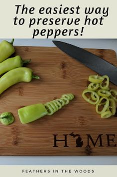 there is a cutting board with peppers on it and the words home written in black