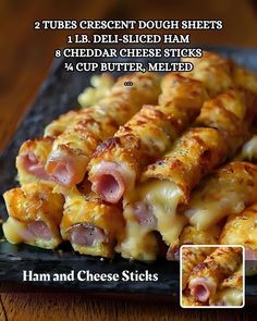 ham and cheese sticks on a black plate