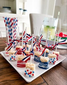 patriotic desserts are arranged on a white plate