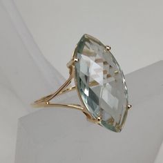 You can choose your own gem in my store. Let me know if you would like to see options Details of the ring Gem: Green Amethyst Gem size & shape: 20x10 mm and Marquise Center Gem weight: 5.85 carat Gold purity: 14K (58.33% approx.) Gold weight: 1.37 grams total weight of ring: 2.54 grams Fine briolette cut Green Amethyst marquise shape gemstone ring set in solid 14K yellow gold. The Gold purity is guaranteed and it comes with authentic 14 kt gold hallmark. Since these Rings are handmade, Size Cust Elegant Green Amethyst Ring For Formal Occasions, Yellow Gold Green Amethyst Ring For Anniversary, Elegant Green Amethyst Ring As A Gift, Elegant Green Amethyst Ring For Anniversary, Fine Jewelry Green Amethyst Ring For Anniversary, Anniversary Green Amethyst Ring In Yellow Gold, Anniversary Green Amethyst Ring In Fine Jewelry Style, Fine Jewelry Green Amethyst Ring, Luxury Green Amethyst Ring For Anniversary