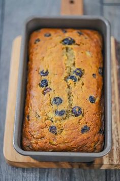 a loaf of blueberry bread in a pan