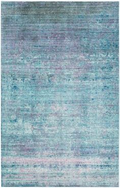 an area rug with blue and pink tones