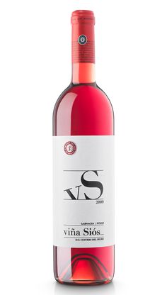 a bottle of wine that is sitting on a white surface with the word s in it