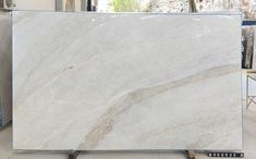 a large white marble slab in a warehouse