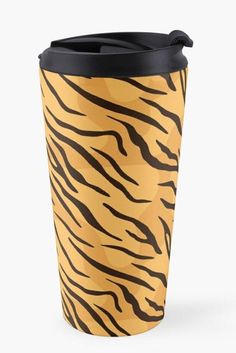 a yellow and black tiger print travel mug