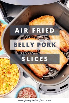 air fried belly pork slices in an air fryer with corn and coleslaw