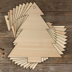 a wooden cutout of a christmas tree