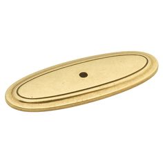 an oval brass door handle on a white background