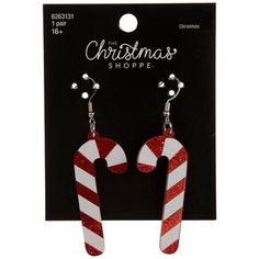 Dimensions: 2.5" x 0.88" Type: Ear Wire Material: Acrylic & Metal Color: White & Red Pattern: Stripes Metal Color: Silver Age Grade: 16+ Quantity: 1 Pair Add the perfect accessory to your outfit like these Candy Cane Glitter Earrings! These adorable earrings feature dangling red and white striped candy canes. The white stripes have a matte finish while the red ones have sparkly glitter. Use these earrings as a stocking stuffer or pair them with a holiday outfit for a complete look! The White Stripes, Silver Age, Glitter Earrings, Holiday Outfit, Red Pattern, Candy Canes, Christmas Jewelry, Red And White Stripes, Hobby Lobby