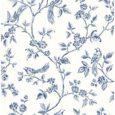 a blue and white wallpaper with flowers on it