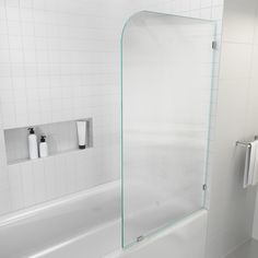 there is a glass shower door in the bathroom