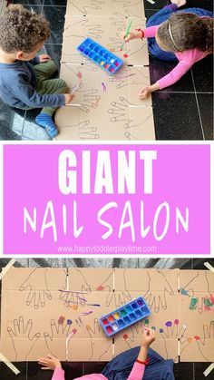 two children playing with giant nail salon letters on the floor and in front of them is a pink sign that says giant nail salon