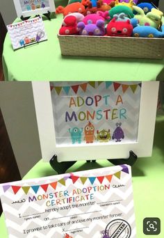 there is a sign that says adopt a monster next to some toys on the table