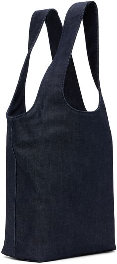 Stretch denim tote in navy. Logo printed at face. · Twin shoulder straps · Patch pocket at interior · Full cotton twill lining · H11.75 x W13.5 x D4.25 · Total height: 20 Supplier color: Indigo Casual Navy Shoulder Bag With Double Handle, Casual Denim Blue Shoulder Bag With Leather Handles, Casual Navy Shoulder Bag With Leather Handles, Navy Cotton Shoulder Bag For Everyday Use, Navy Cotton Casual Shoulder Bag, Indigo Casual Everyday Bags, Casual Navy Cotton Shoulder Bag, Casual Indigo Everyday Bag, Navy Logo